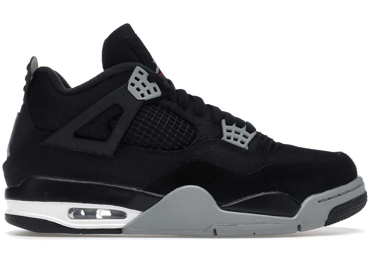 Black and grey Jordan 4 sneaker in canvas material side view