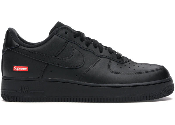 Black AIR FORCE 1 LOW Supreme sneaker with leather upper and red Supreme logo on side