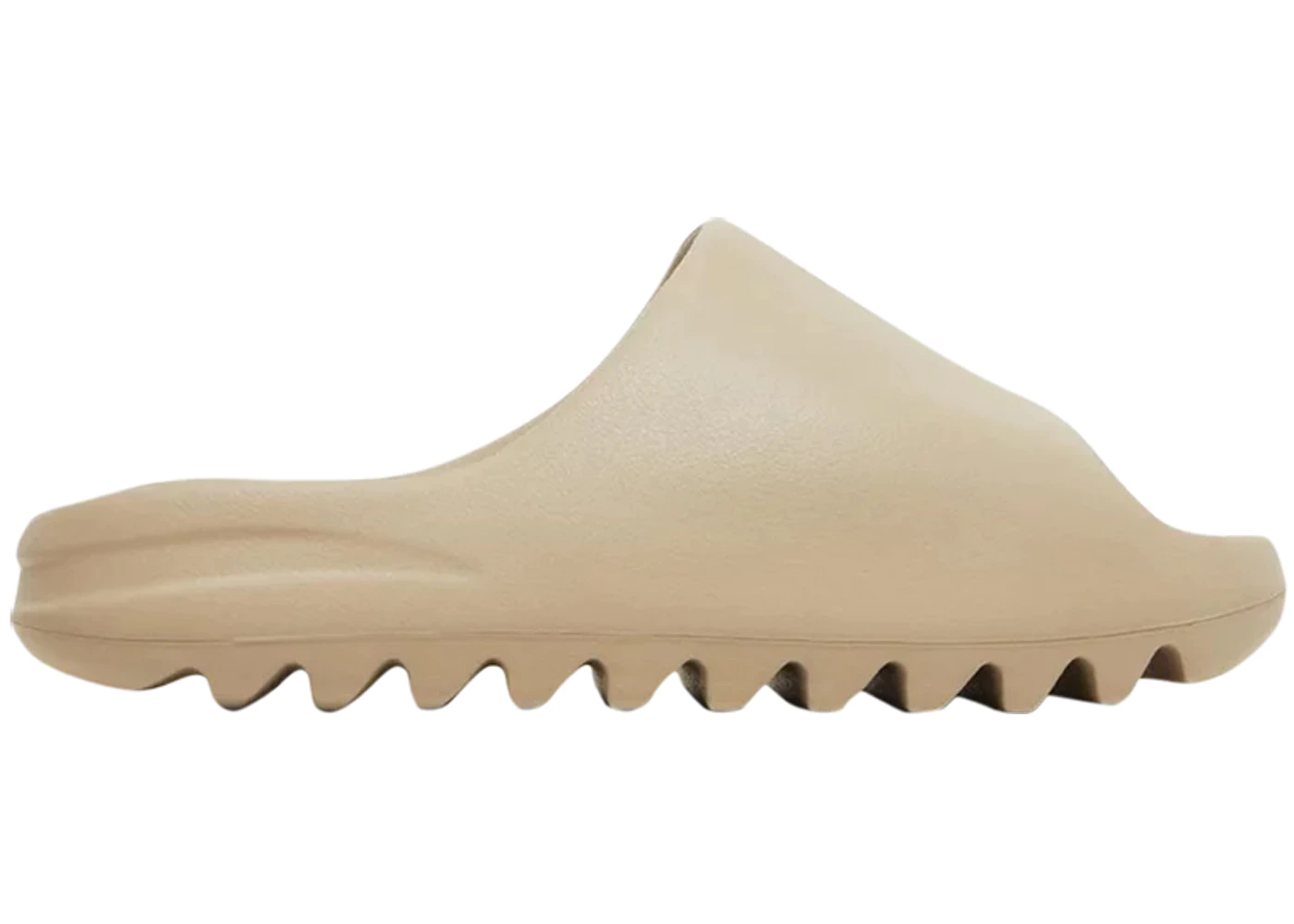 YEEZY SLIDE BONE beige slide sandal with jagged sole side view