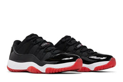 JORDAN 11 LOW RETRO “BRED”