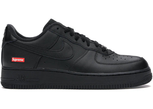 Black AIR FORCE 1 LOW Supreme sneaker with leather upper and red Supreme logo on side