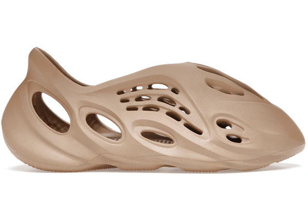 adidas Yeezy Foam RNNR shoe in ochre color with ventilation holes and unique design
