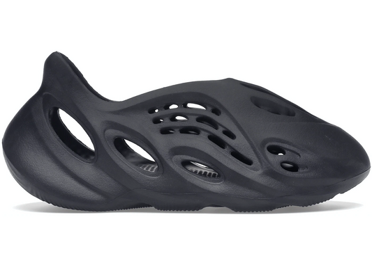 Black YEEZY FOAM RUNNER slip-on sneaker with ventilation holes and unique futuristic design