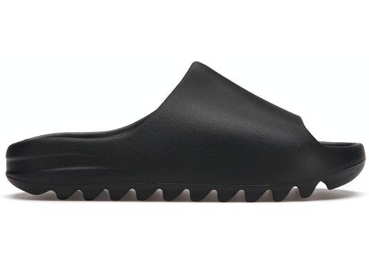 YEEZY SLIDE ONYX black minimalist slide sandal with ridged sole