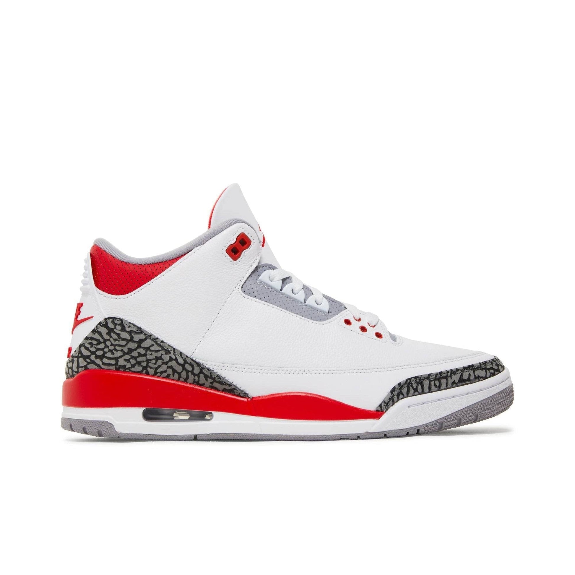 Side view of a Jordan 3 Retro Fire Red sneaker with white, red, and gray elephant print accents