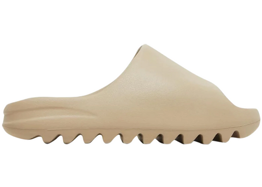 YEEZY SLIDE BONE beige slide sandal with jagged sole side view